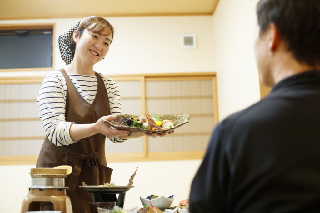 Home-cooked seafood dinner with a local Minpaku host family