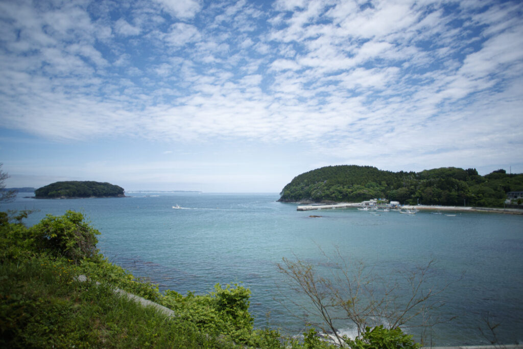 A stunning panoramic ocean view of Shizugawa Bay seen directly from the guesthouse