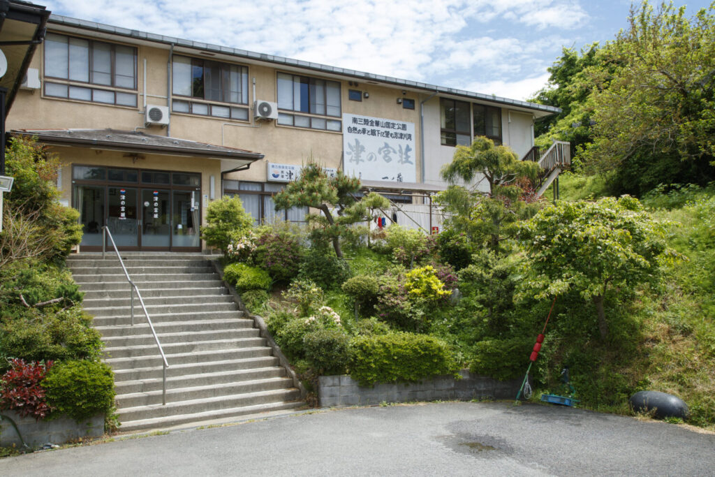 Exterior of Minshuku Tsunomiyaso, a traditional seaside fisherman's guesthouse in Minamisanriku