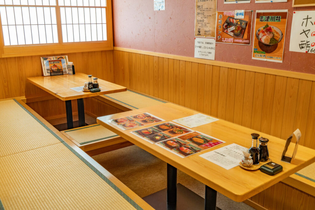Comfortable seating area inside Benkei Sushi including traditional Japanese and Western-style seating