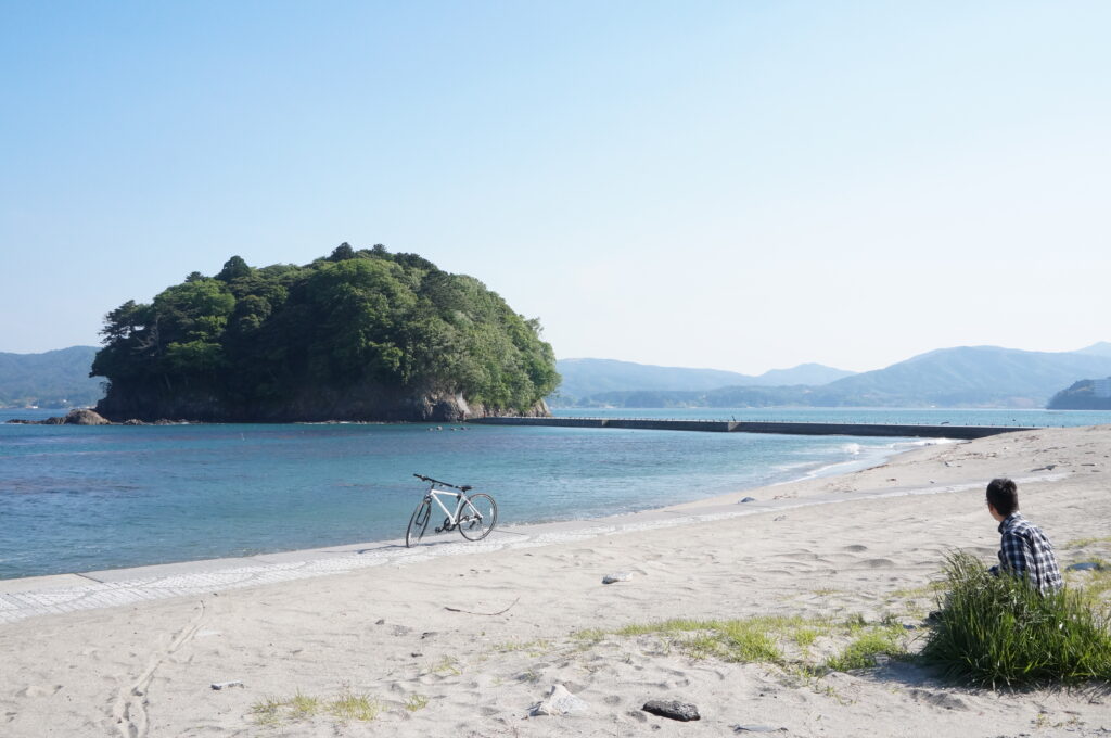 A stunning view of Arashima Island seen from the beautiful sands of the Blue Flag-certified Sun-ole Sodehama Beach