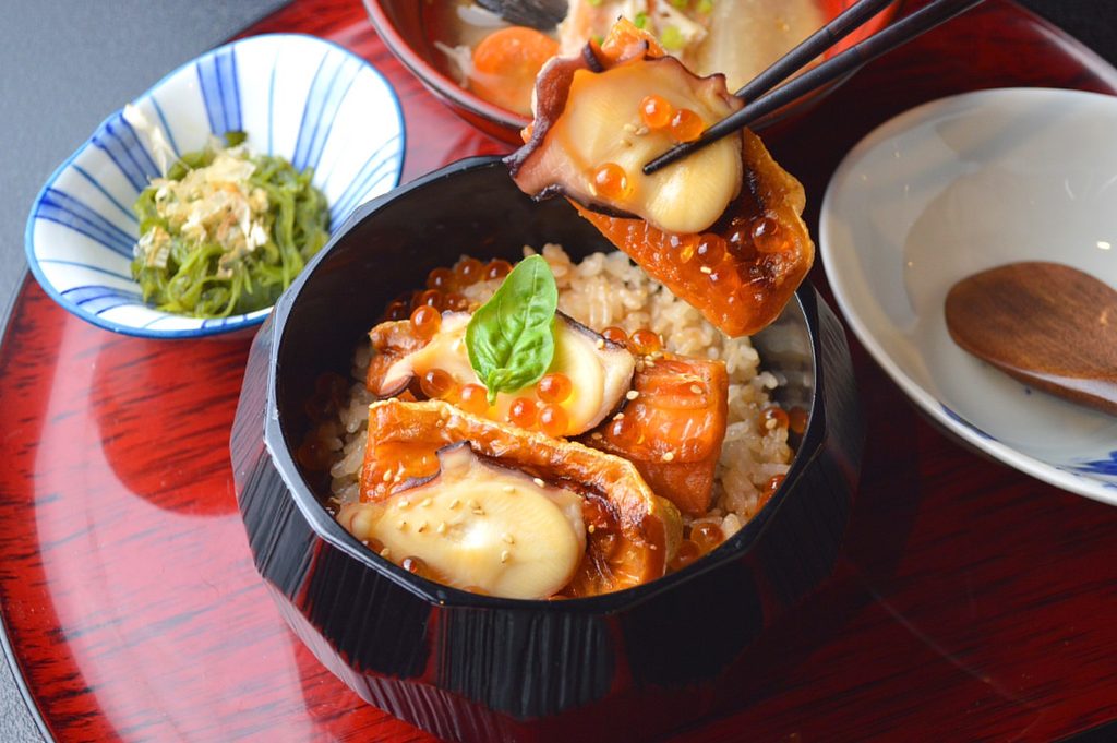A vibrant and seasonal Kira Kira Don, Minamisanriku's famous seafood bowl packed with fresh local catches