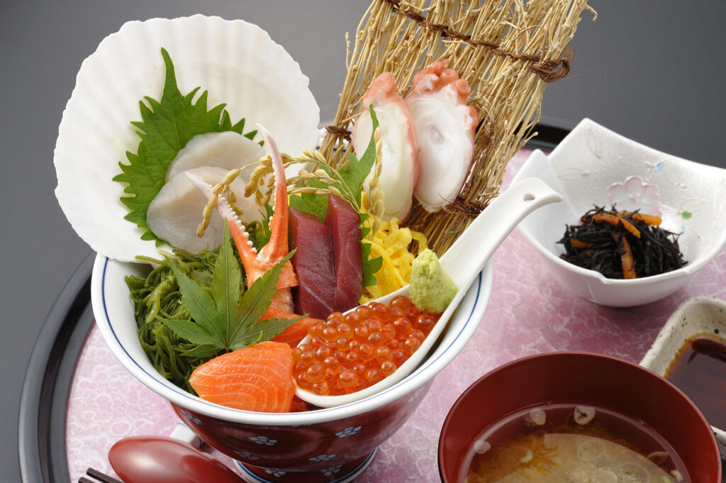 Premium seafood bowl topped with fresh local specialties